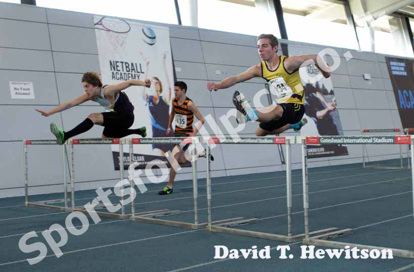 Oliver Whelans(Chester le Street) and Anthony Hogg (Jarrow) in a close finish under-17 60 metres hurdles.
